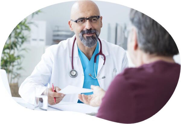 Male doctor consulting patient - Brenzavvy