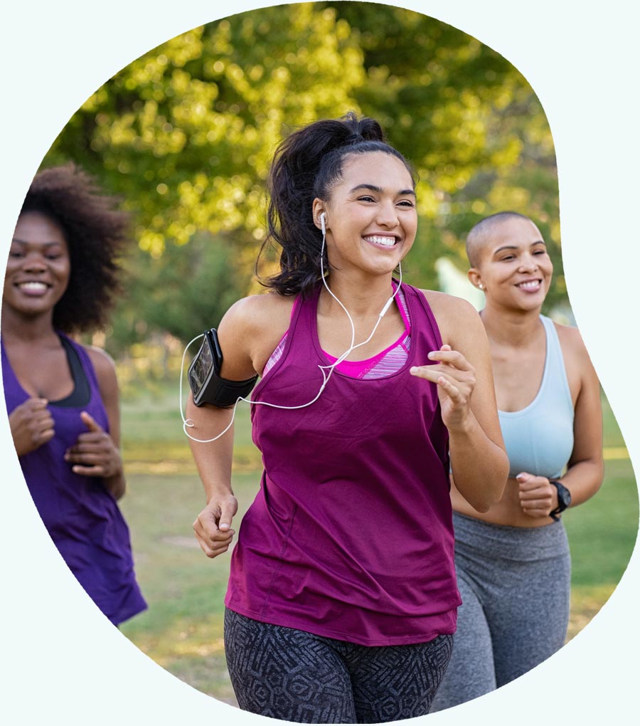 Group of women exercising in the park - Brenzavvy
