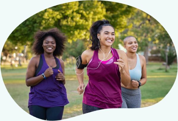 Group of women exercising in the park - Brenzavvy